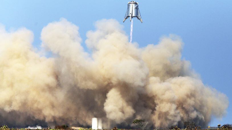 SpaceX continue their test on their StarHopper at Boca Chica Beach successfully hovering 500 feet above the launch site and safely landing on SpaceX Launch Pad. (Miguel Roberts/The Brownsville Herald via AP)