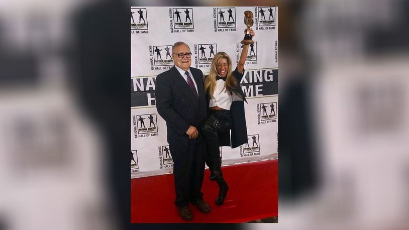 Amy Hayes (right) with her father last week when she was inducted into the Boxing Hall of Fame. CONTRIBUTED