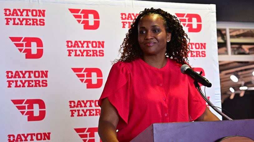 Tamika Williams-Jeter speaks at a press conference at UD Arena on Monday, March 28, 2022, as she's introduced as the new Dayton women's basketball coach. Photo by Erik Schelkun