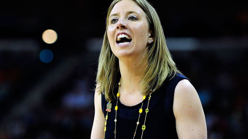 NEW ORLEANS, LA - APRIL 07: Lindsay Gottlieb, head coach of the California Golden Bears, instructs her team against the Louisville Cardinals during the National Semifinal game of the 2013 NCAA Division I Women’s Basketball Championship at New Orleans Arena on April 7, 2013 in New Orleans, Louisiana. (Photo by Stacy Revere/Getty Images)