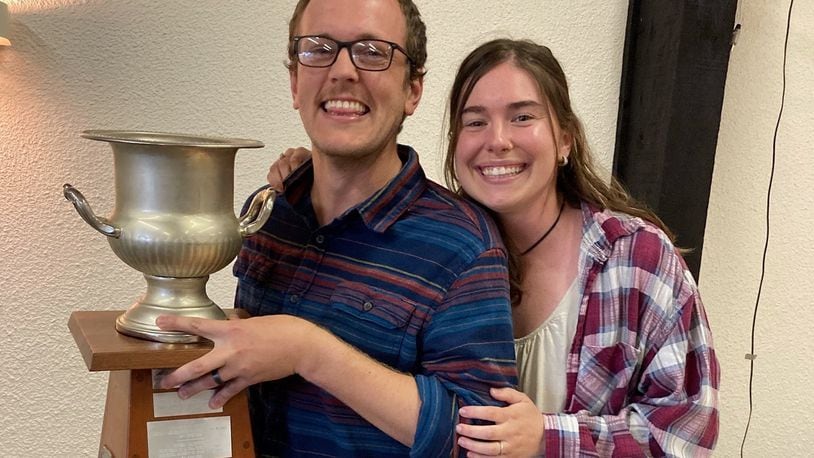 Josh Fries and his wife Sarah with the Botham Cup. CONTRIBUTED
