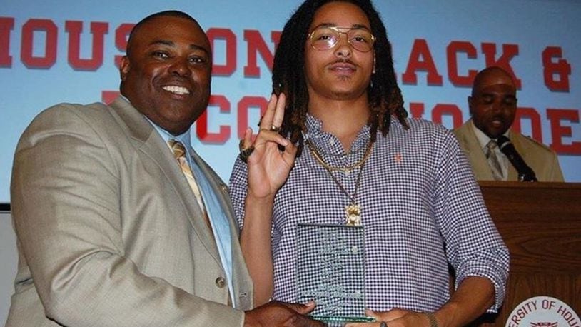 Houston head coach Leroy Burrell (left) and Brian Bell at the Cougars’ awards banquet. UNIVERSITY OF HOUSTON PHOTO