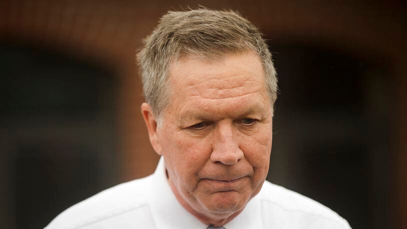 Republican presidential candidate, Ohio Gov. John Kasich, speaks with members of the media after voting in the primary election Tuesday, March 15, 2016, in Westerville, Ohio. (AP Photo/Matt Rourke)