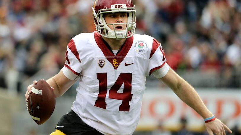 Southern California quarterback Sam Darnold looks to pass against Penn State during the first half of the Rose Bowl NCAA college football game Monday, Jan. 2, 2017, in Pasadena, Calif. (AP Photo/Jae C. Hong)