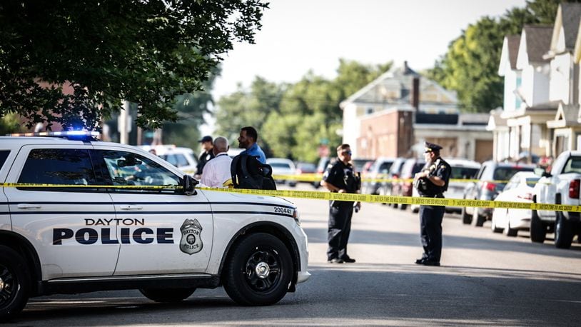 Dayton police investigate a deadly shooting that happened late Thursday afternoon, Aug. 10, 2023, on South Monmouth Street near East Fourth Street on east side of the city. JIM NOELKER/STAFF