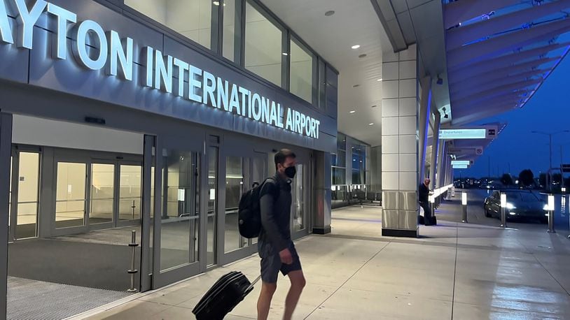 A passenger exits the Dayton International Airport. CORNELIUS FROLIK / STAFF