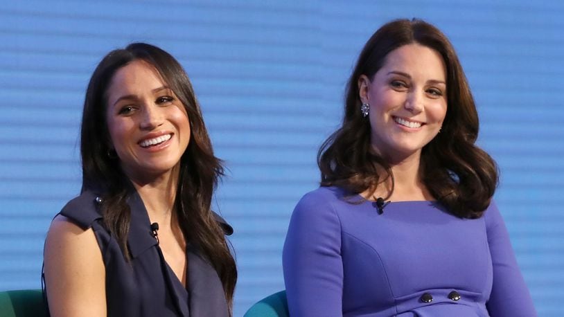Meghan Markle, left, and Catherine, Duchess of Cambridge, attend the first Royal Foundation Forum on February 28, 2018, in London. (Rota/i-Images/Zuma Press/TNS)