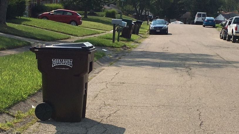 A proposal in Miami Twp. would restrict the time that garbage containers could be on the curbs of properties. NICK BLIZZARD/STAFF