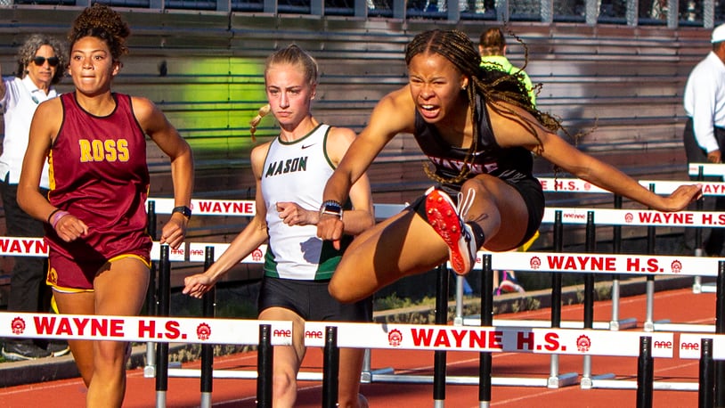 Wayne freshman Ric'Keya White won the 100-meter hurdles in 13.98 seconds to advance to state at Friday's Division I region meet at Wayne High School. White also won the 300 hurdles and was third in the 100. Jeff Gilbert/CONTRIBUTED