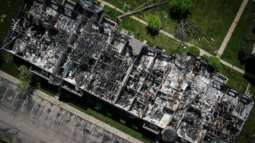 This is an aerial photo of a burned-out apartment building at the Woodland Hills complex in Trotwood in May 2022. The development sits empty three years after the 2019 Memorial Day tornadoes ripped through the area. JIM NOELKER/STAFF