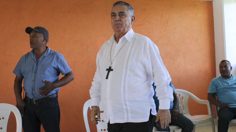 Monsignor Salvador Rangel, bishop of the Chilpancingo-Chilapa diocese, arrives to meet with people displaced by violence in Los Morros, Guerrero, Mexico, July 18, 2018. The retired Roman Catholic bishop who was famous for trying to mediate between drug cartels in Mexico was located and taken to a hospital after apparently being briefly kidnapped, the Mexican Council of Bishops said Monday, April 29, 2024. (AP Photo/Alejandrino Gonzalez)