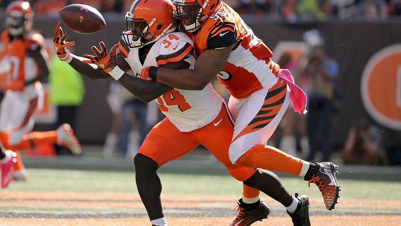 CINCINNATI, OH - OCTOBER 23: Vontaze Burfict #55 of the Cincinnati Bengals tackles Isaiah Crowell #34 of the Cleveland Browns during the third quarter at Paul Brown Stadium on October 23, 2016 in Cincinnati, Ohio. (Photo by Andy Lyons/Getty Images)