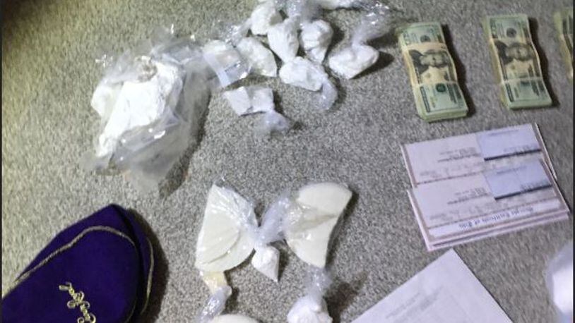 Two pounds of powder and suspected crack cocaine and suspected marijuana were recovered when Drug Task Force officers executed a search warrant at a Georgia home.