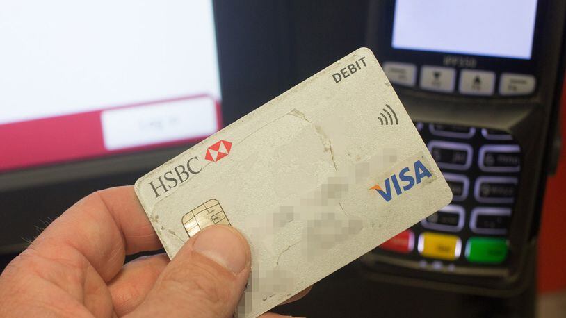 File photo of a credit card with a chip embedded in it. (EDITORS NOTE: Card details have been pixelated)