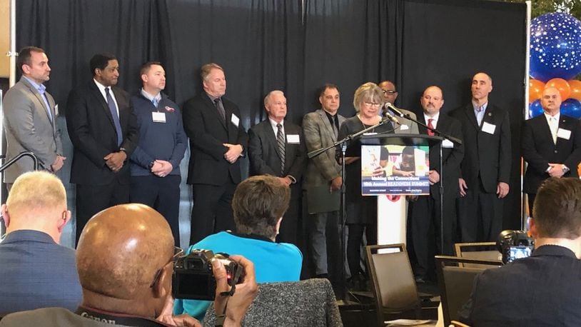 Superintendents of 11 of Montgomery County’s 16 school districts attended the 10th annual Kindergarten Readiness Summit, Friday, March 8, 2019 at Sinclair Community College. As Huber Heights Superintendent Sue Gunnell speaks, from left are Rob O’Leary (Vandalia-Butler), Richard Gates (Jefferson Twp.), Chad Wyen (Mad River), Greg Williams (New Lebanon), Tom Henderson (Centerville), Tony Thomas (Northmont), Tyrone Olverson (Trotwood), Dave Jackson (Northridge), Kyle Ramey (Oakwood) and David Vail (Miamisburg). JEREMY P. KELLEY / STAFF