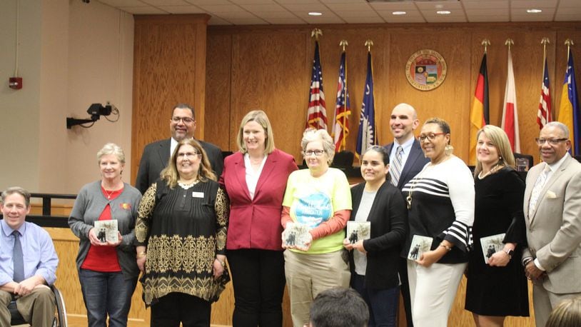 Dayton city commissioners and Mayor Nan Whaley honored the winners of the Mayor’s awards at the weekly city commission meeting. The big winner of the night was the entire city, which won Daytonian of the Year. CORNELIUS FROLIK / STAFF