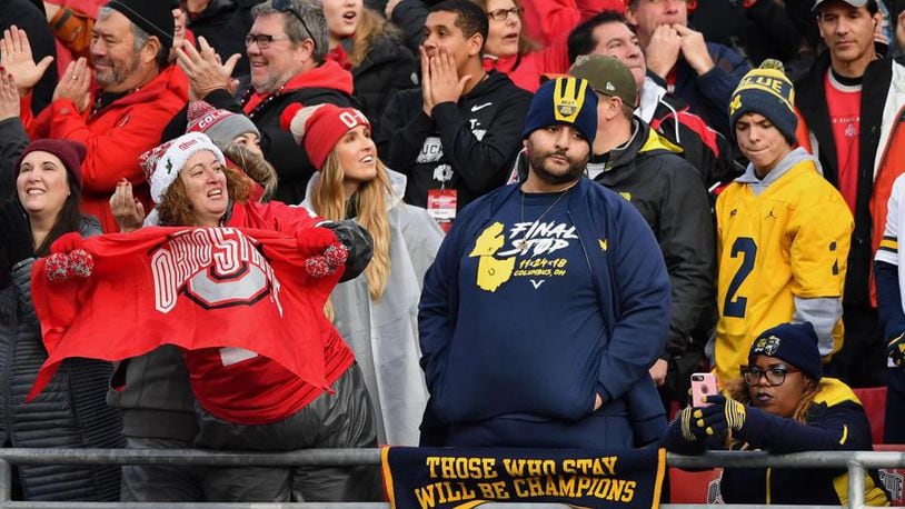 Ohio State fans partied while Michigan fans frowned last season in Columbus. (Getty Images)