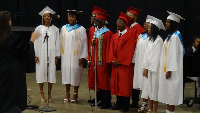 Students perform during the graduation ceremony for Trotwood-Madison High School at the Dayton Convention Center last year. CONTRIBUTED PHOTO
