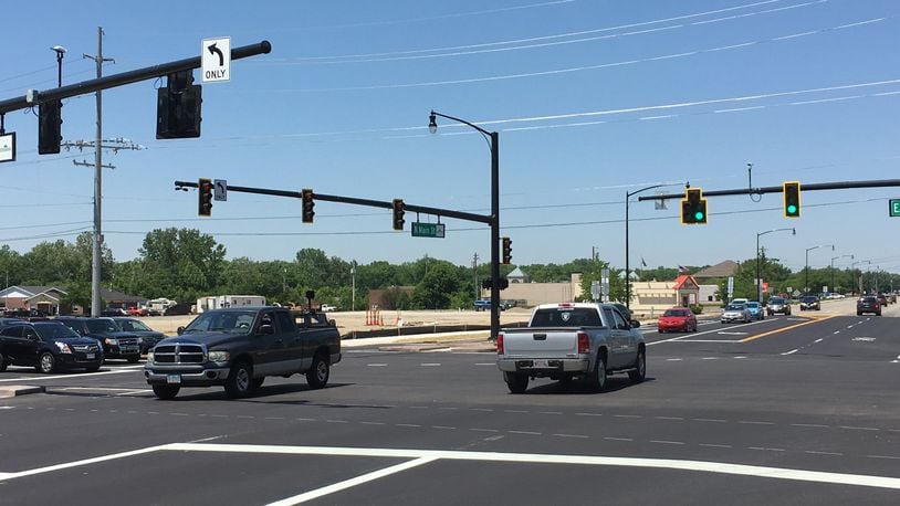 Traffic is flowing through the intersection of Ohio 741 and Ohio 73 in Springboro, as $10 million in road work is winding up. STAFF/LAWRENCE BUDD