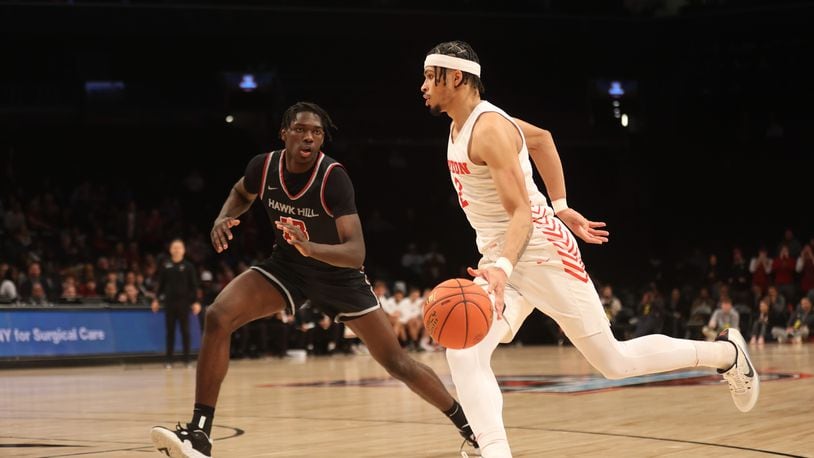 Dayton's Toumani Camara dribbles against Saint Joseph’s in the quarterfinals of the Atlantic 10 Conference tournament on Thursday, March 9, 2023, at the Barclays Center in Brooklyn, N.Y. David Jablonski/Staff