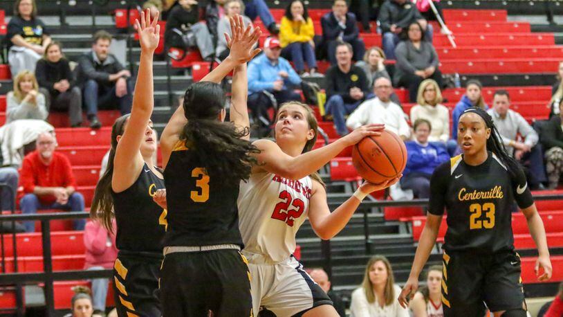 Tecumseh High School senior Corinne Thomas shoots the ball in traffic during the Arrows game against Centerville on Monday night in New Carlisle. The Elks won 73-56. CONTRIBUTED PHOTO BY MICHAEL COOPER
