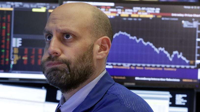 Specialist Meric Greenbaum works on the floor of the New York Stock Exchange. The stock market closed sharply lower, extending a weeklong slide, as the Dow Jones industrial average plunged more than 600 points. Some investors believe the market can recover, noting that both global economic growth and corporate earnings remain strong. One hallmark of this bull market has been investors’ willingness to buy the dips. This week’s drop could test their resolve. (AP Photo/Richard Drew)