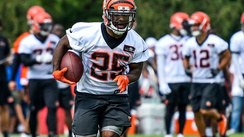 Running back Giovani Bernard carries the ball during the first day of Cincinnati Bengals Training Camp Friday, July 28 at the practice fields beside Paul Brown Stadium in Cincinnati. NICK GRAHAM/STAFF