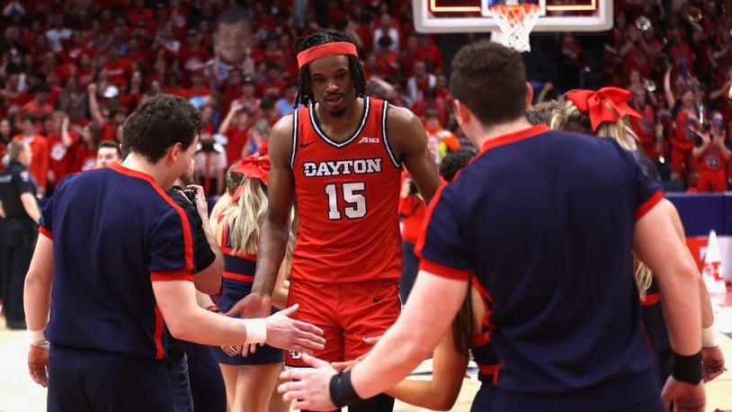 Dayton's DaRon Holmes II leaves the court after a victory against Virginia Commonwealth on Friday, March 8, 2024, at UD Arena. David Jablonski/Staff