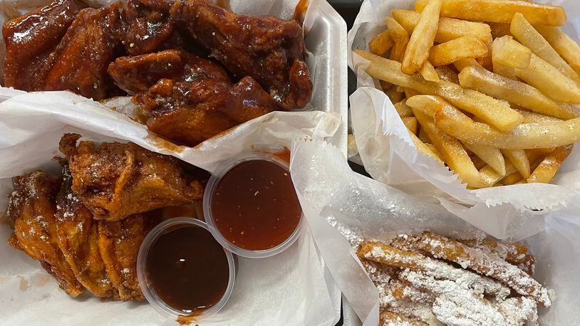 Wings Fly, a family owned and operated restaurant, has opened its doors at 960 Patterson Road in Dayton. NATALIE JONES/STAFF