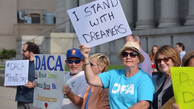 A group of supporters of the Deferred Action for Childhood Arrivals (DACA) program rallied outside of the Rep. Mike Turner’s office and the federal bankruptcy court building. JIM OTTE / STAFF
