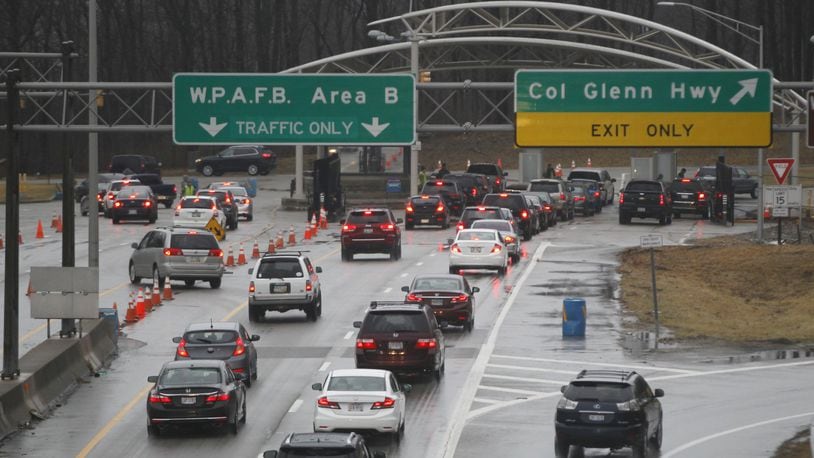 Area B gate at Wright-Patterson Air Force Base during the morning rush. A portion of Kaufman Avenue is closed and houses are under evacuation after a suspicious package was found Thursday, May 18, 2023, outside in the Woods housing area of Area B. TY GREENLEES / STAFF FILE