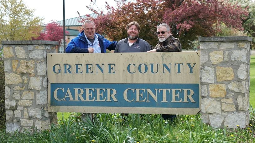 The former Greene County Career Center building will become a hub of activity again this fall. A group of tradesmen are working to turn the building into a trade school for those recovering from addiction. In the photo, from the left, stand owners Doug Van Dyke, Chris Adams and Kip Morris. CONTRIBUTED