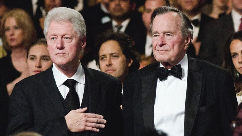 WASHINGTON, DC - MARCH 21: Bill Clinton and George H.W. Bush attend the Points of Light Institute Tribute to Former President George H.W. Bush at The John F. Kennedy Center for Performing Arts on March 21, 2011 in Washington, DC. (Photo by Kris Connor/Getty Images)