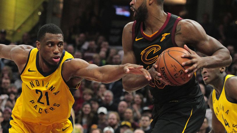 FILE: Cleveland Cavaliers center Tristan Thompson keeps the ball from Indiana Pacers forward Thaddeus Young in the first quarter of Game 7 during the Eastern Conference First Round series on Sunday, April 29, 2018 at Quicken Loans Arena in Cleveland, Ohio. The Cavs won the game, 105-101. (Leah Klafczynski/Akron Beacon Journal/TNS)