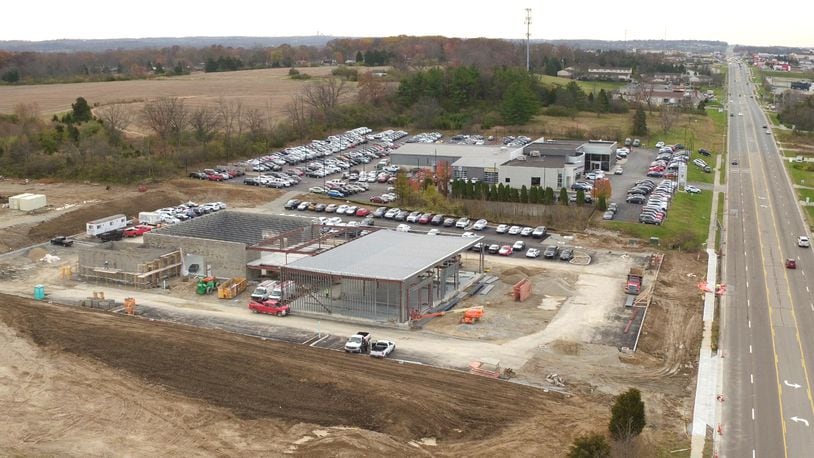White Allen is building a new Volkswagen dealership next to its European Auto Group on North Springboro Pike in Miami Township. The 20,200-square-foot facility is expected to open in spring 2018. This photo is from late 2017. TY GREENLEES / STAFF