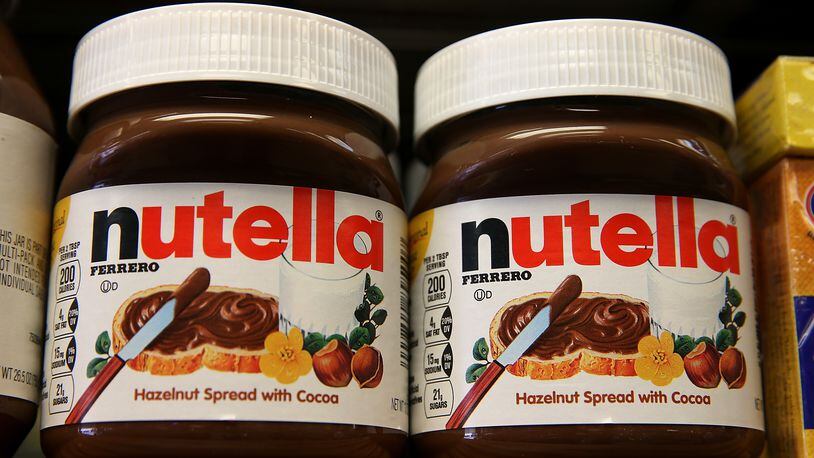 Jars of Nutella on store shelves.