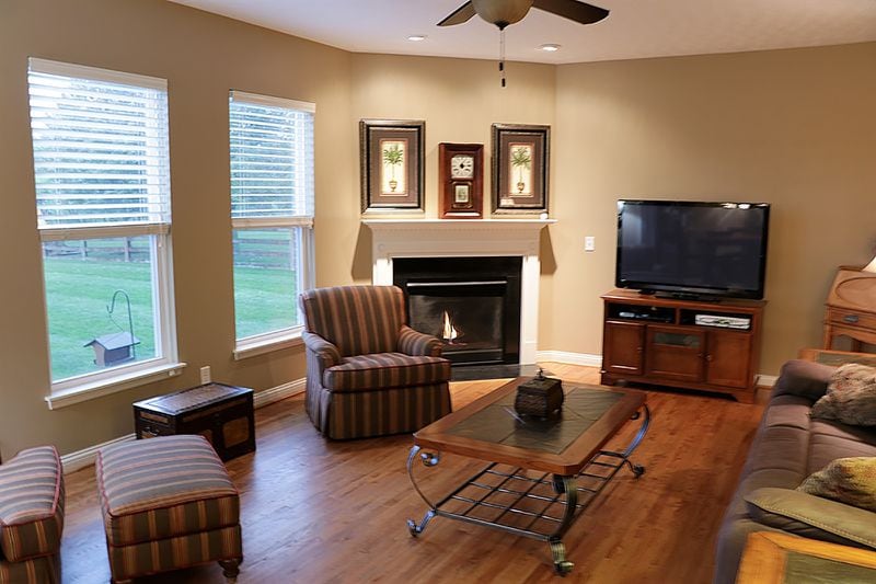 Hardwood flooring fills the entire main level, including the great room, dining room, kitchen and breakfast room. Hardwood floors are also within the upstairs main bedroom. A corner, gas fireplace can be enjoyed by both the great room and breakfast room. CONTRIBUTED PHOTO BY KATHY TYLER