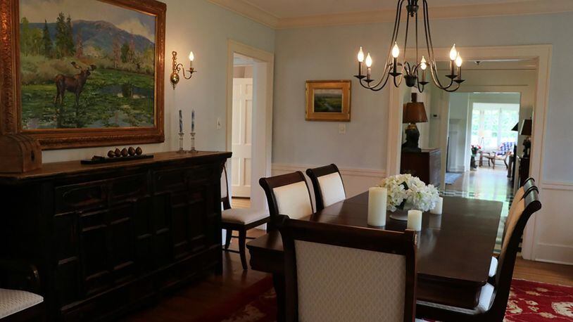 A chandelier centers the formal dining room.