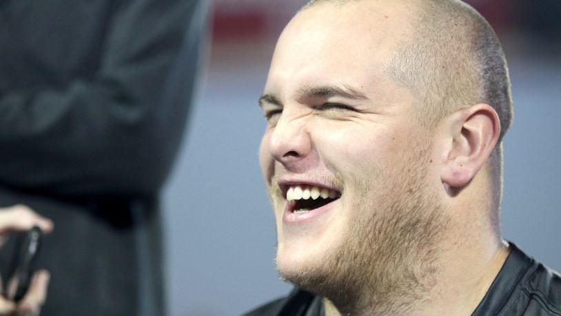 Billy Price laughs as he answers a question Thursday at the Woody Hayes Athletic Center. David Jablonski/Staff