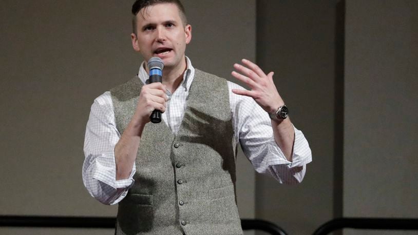 FILE - In this Dec. 6, 2016, file photo, Richard Spencer, who leads a movement that mixes racism, white nationalism and populism, speaks at the Texas A&M University campus in College Station, Texas. A lawsuit has been filed against Michigan State University after it denied a request to rent space on campus for Spencer to speak in September. Georgia State University student Cameron Padgett, who tried to rent the room, sued Sunday, Sept. 3, 2017, alleging the university is violating Spencer’s free speech. (AP Photo/David J. Phillip, File)