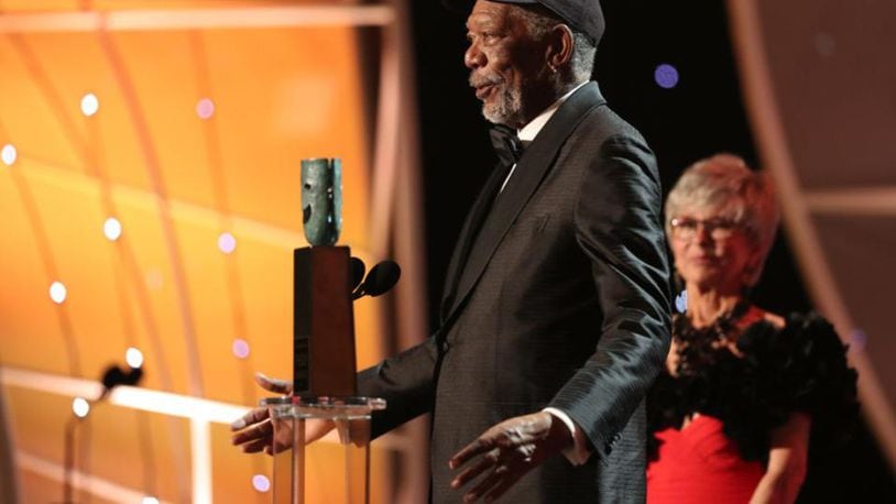 LOS ANGELES, CA - JANUARY 21:  Honoree Morgan Freeman accepts the Life Achievement Award from actor Rita Moreno onstage during the 24th Annual Screen Actors Guild Awards at The Shrine Auditorium on January 21, 2018 in Los Angeles, California. 27522_010  (Photo by Christopher Polk/Getty Images for Turner Image)