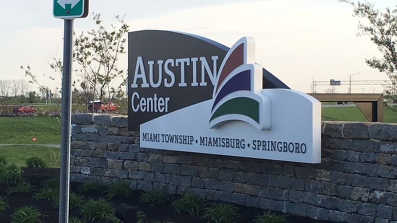 Miami Twp. recently accepted a proposal from Austin Landing’s developer for short-term deal for exclusive rights to market a large tract of land at the interchange near the sprawling mixed retail center off Interstate 75. NICK BLIZZARD/STAFF