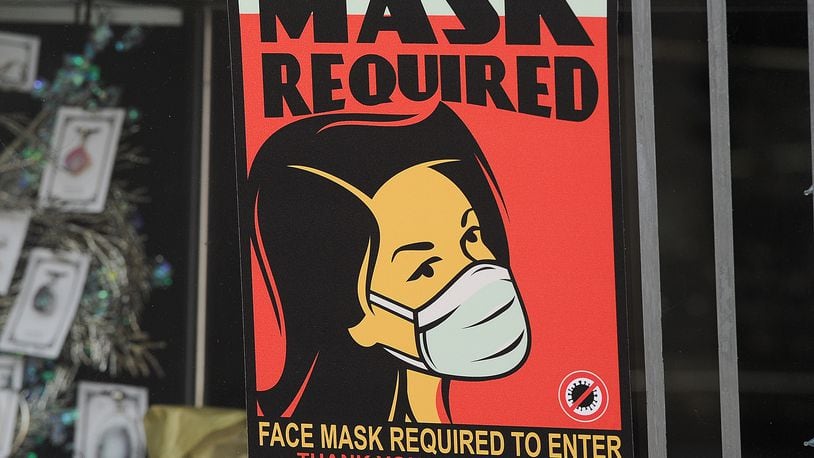 In the village of Yellow Springs, masks have been mandated indoors in the central business district and outdoors on public property downtown. MARSHALL GORBY\STAFF