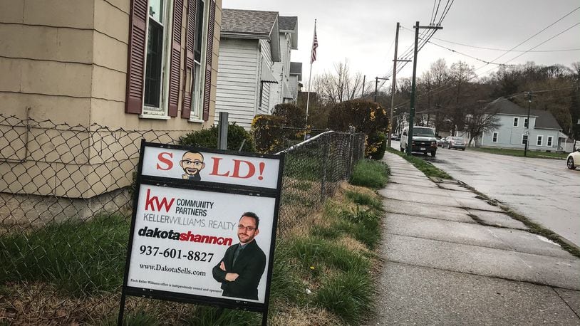 A house that recently sold on Wayne Ave in Dayton. Realtors say that people are still looking for and buying houses in the midst of the COVID-19 crisis but things are slowing down some. JIM NOELKER/STAFF