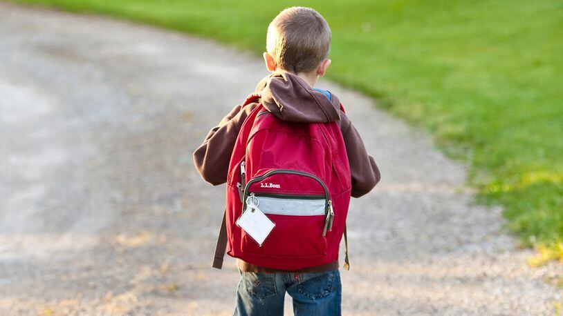 FILE PHOTO: A little boy with autism was having a rough day on the first day of school so a classmate helped him get over his fears.