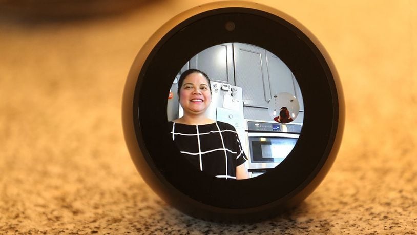 Armida Rosales and her husband, Arnold, had not thought much about voice-activated technology in their new Maple Valley home, but Amazon’s Alexa was included and the family likes the convenience. Rosales is seen in an Echo “Spot” camera on June 12, 2018. (Greg Gilbert/Seattle Times/TNS)
