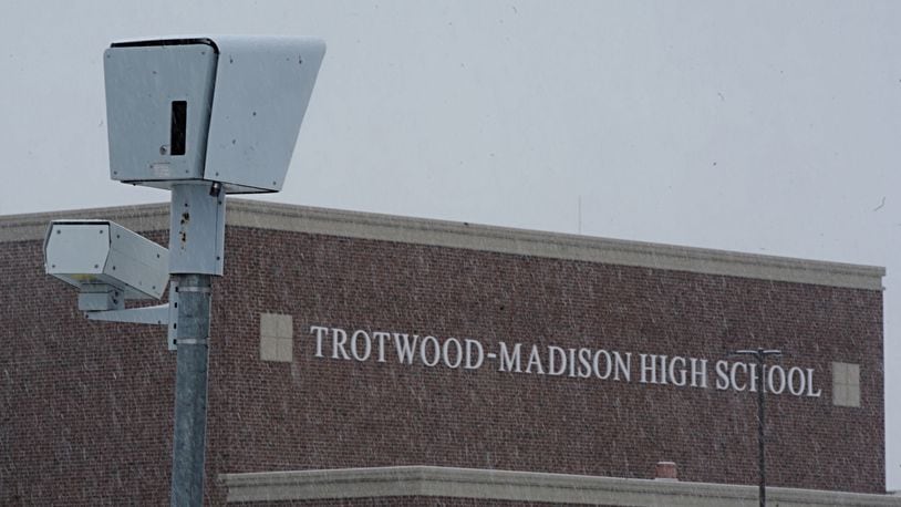 The city of Trotwood is reconnecting red light and speed cameras like this one in front of Trotwood Madison High School. MARSHALL GORBY\STAFF