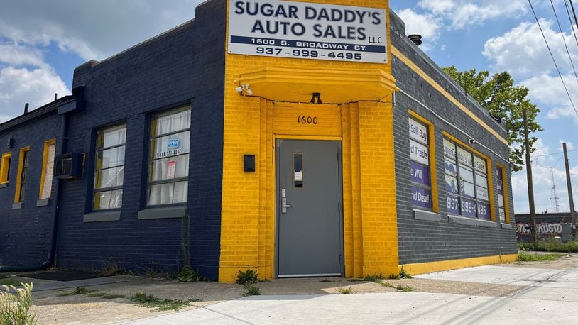 The owner of Sugar Daddy's Auto Sales at 1600 S. Broadway St. would like to turn the business into an adult theater that has exotic dancing and pole dancing. CORNELIUS FROLIK / STAFF