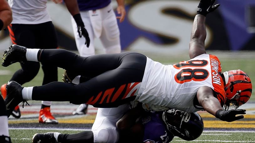 BALTIMORE, MD - SEPTEMBER 27: Defensive tackle Brandon Thompson #98 of the Cincinnati Bengals tackles running back Justin Forsett #29 of the Baltimore Ravens in the third quarter of a game at M&T Bank Stadium on September 27, 2015 in Baltimore, Maryland. (Photo by Rob Carr/Getty Images)