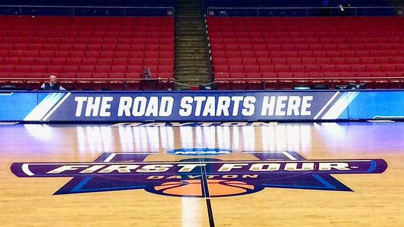 Mid-court sign, "The Road Starts Here" at the First Four at UD Arena in Dayton, Ohio.